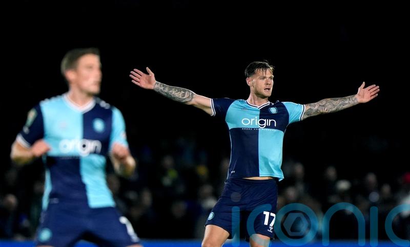 Early goal sees leaders Wycombe to win over Wigan