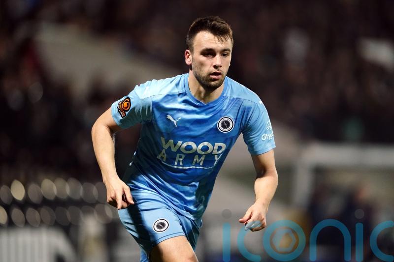 National League side Dagenham dump League Two AFC Wimbledon out of FA Cup