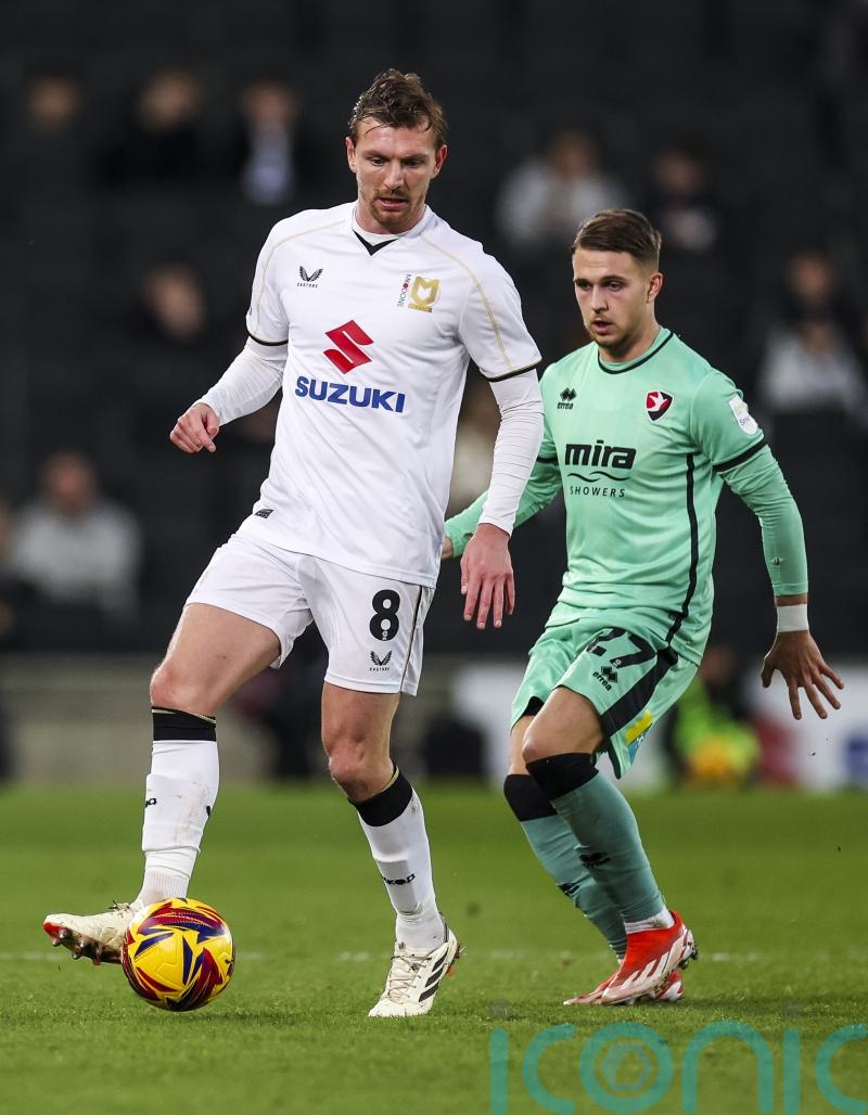 MK Dons secure sixth straight win by beating 10-man Chesterfield