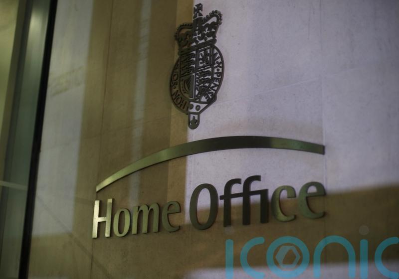 Man in custody after Albanian nationals found hidden in livestock wagon