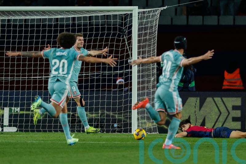 Atletico Madrid record long-awaited win at Barcelona to go top of LaLiga