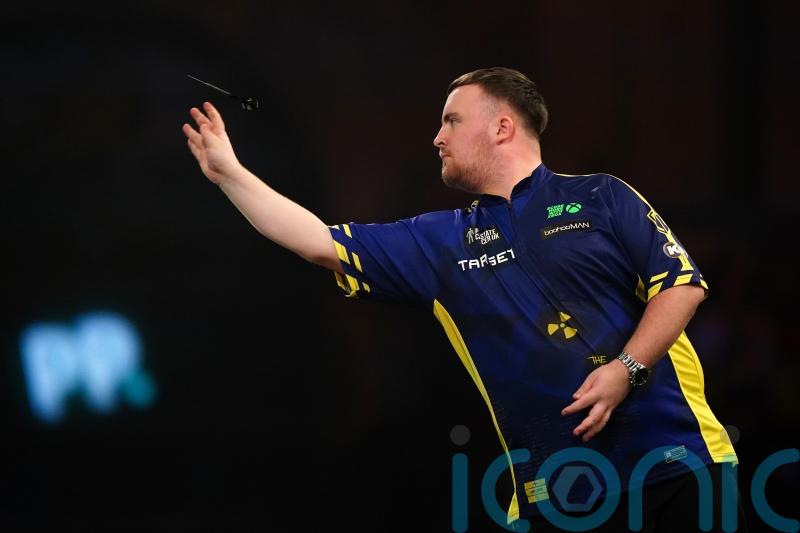 Luke Littler overcomes slow start to progress at World Darts Championship