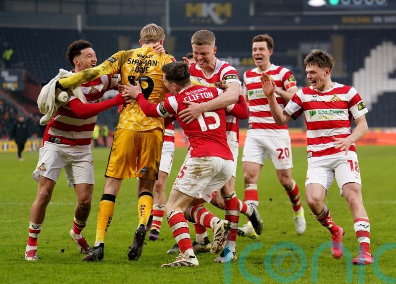 Doncaster shock Hull with penalty shootout victory to reach FA Cup round four