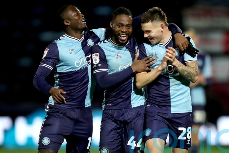 Dan Udoh on target as promotion-chasing Wycombe see off struggling Burton