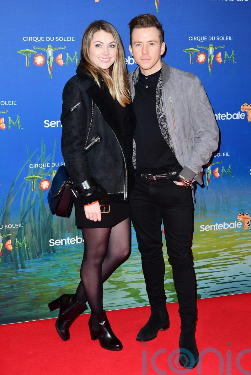 Danny Jones &lsquo;deeply apologises to wife and family&rsquo; after kissing reports