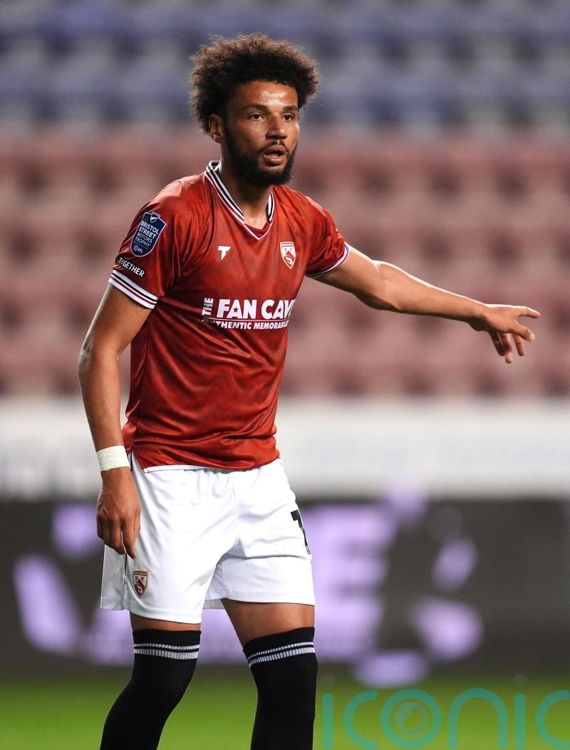 Morecambe keep survival hopes alive as Lee Angol goal sees off Swindon