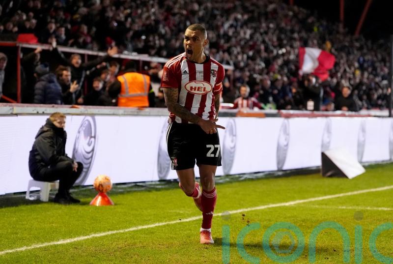 Josh Magennis leads by example to give Exeter victory at Barnsley