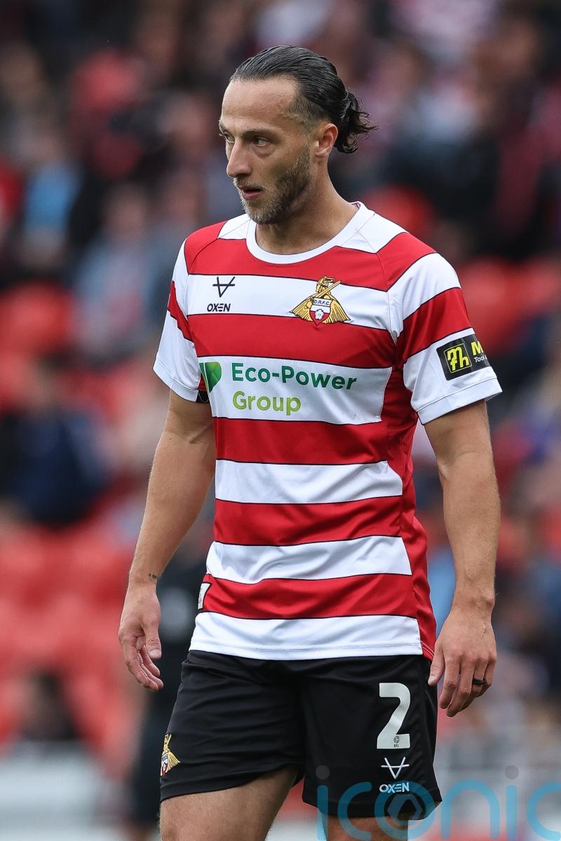 Doncaster and AFC Wimbledon share spoils in battle for automatic promotion