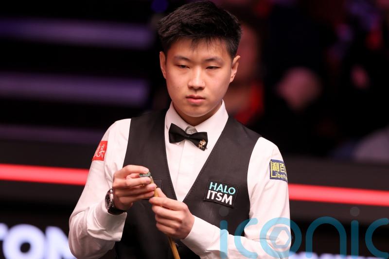 Xiao Guodong and Zhao Xintong continue Chinese charge at World Championship