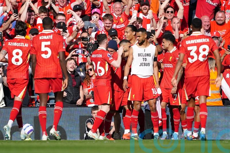 Liverpool secure Premier League title with crushing win against Tottenham