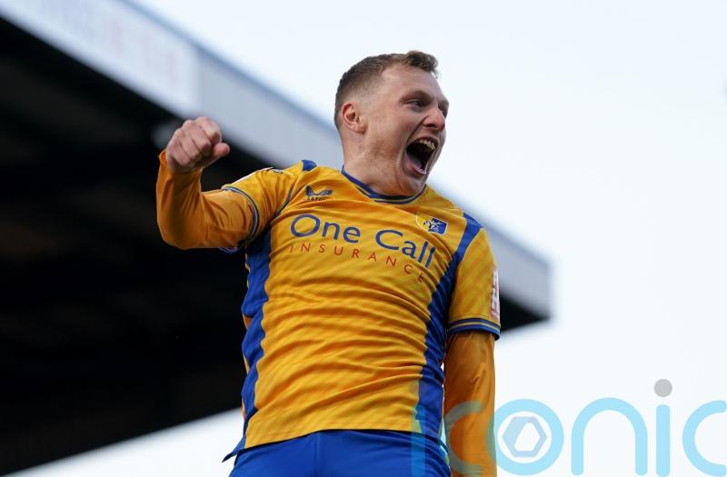 Mansfield end winless run in style as Peterborough are swept aside