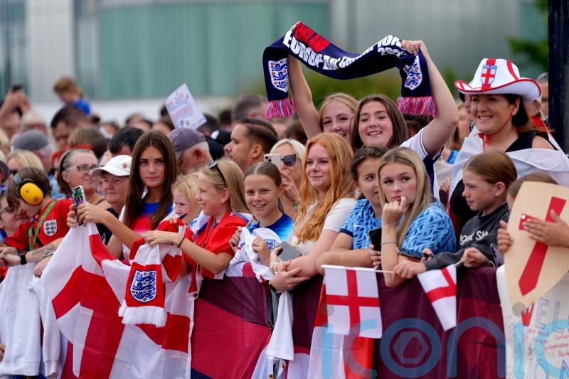 Football comes home: Jubilant fans greet Lionesses on return to England