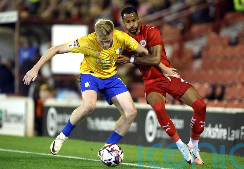 Late Will Evans strike guides Mansfield to opening victory of season