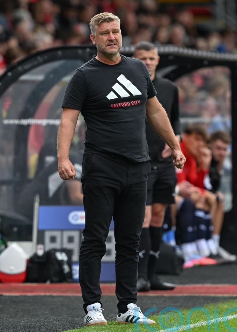 Salford boss Karl Robinson says he has been promised money for new striker