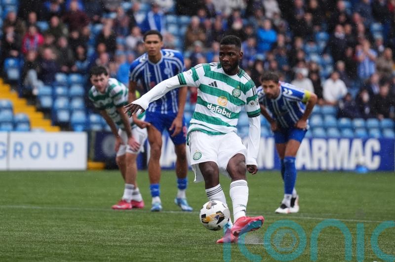 Kelechi Iheanacho scores late penalty on debut as Celtic win amid fans&rsquo; protest