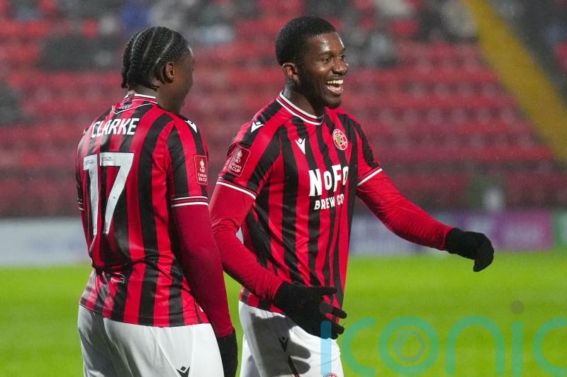 Daniel Kanu pounces to fire Walsall four points clear with victory at Oldham