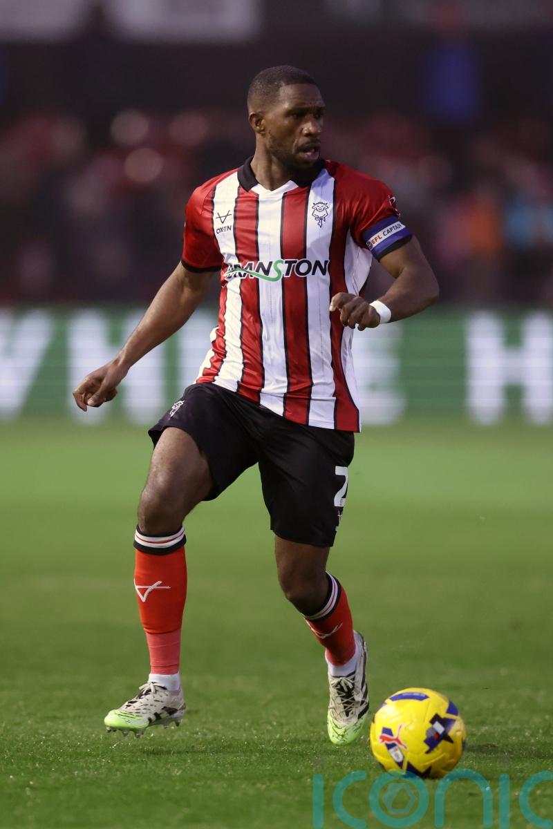 Promotion-chasing Lincoln hit five past Peterborough to stretch unbeaten run