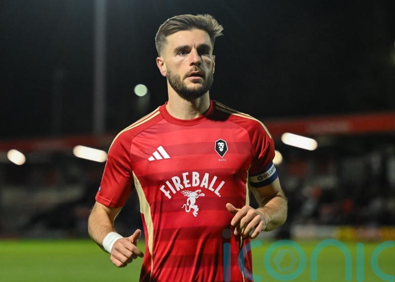 Luke Garbutt helps Salford set up Manchester City clash by beating Swindon