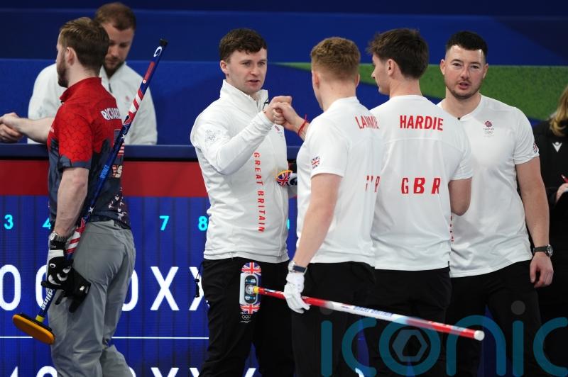 Britain&rsquo;s men face anxious wait to see if they will make Olympic curling semis